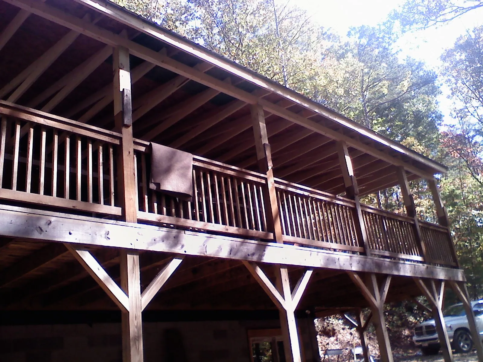 Timber framing under a new elevated porch and deck — Roof Leak Repair in O Fallon by Roofing Brothers